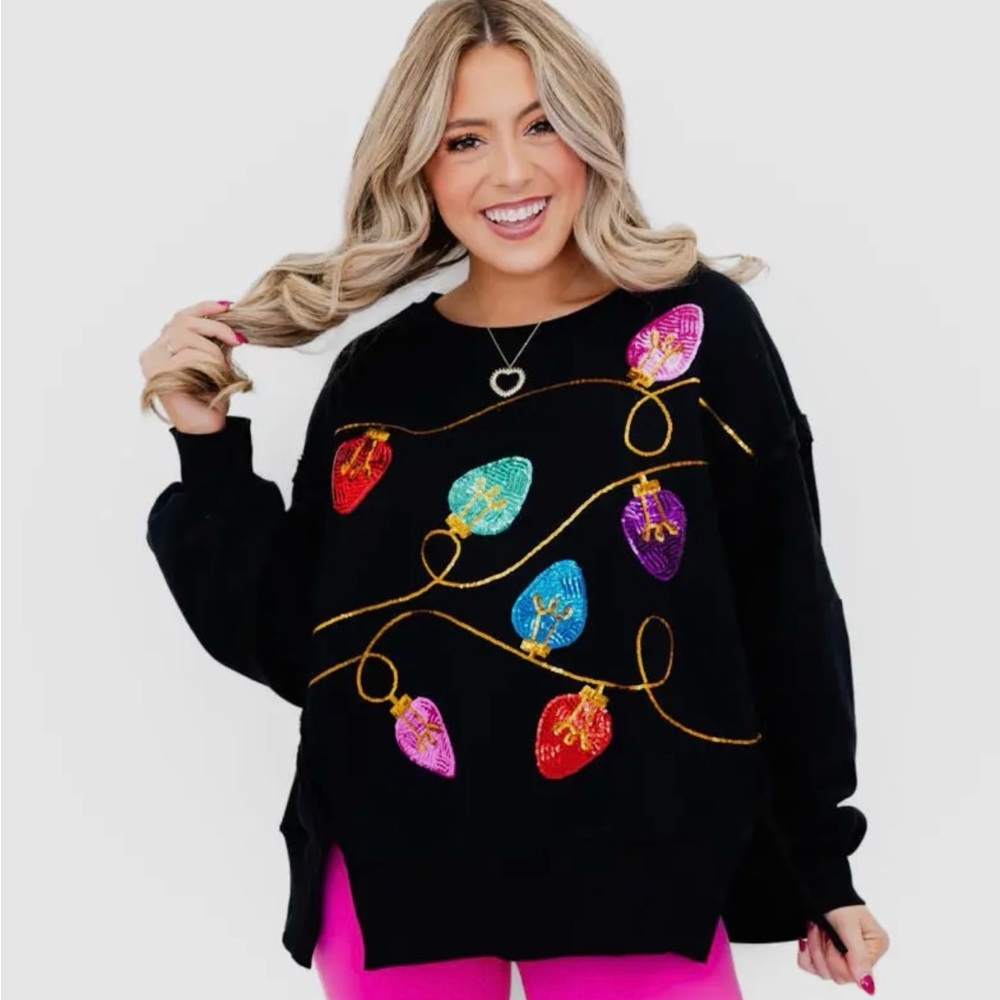 Festive Black Sweater with Colorful Light Design